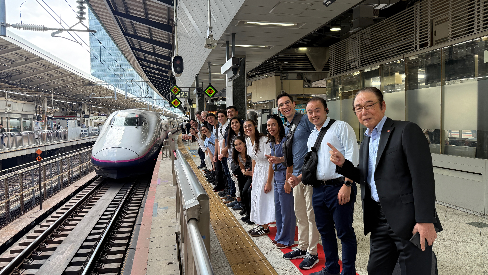 Team boarding the Shinkansen in Japan